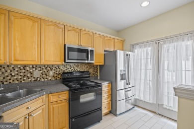 Charming  2-story townhome located in Little Suwanee Pointe on Collins Hill Golf Club in Georgia - for sale on GolfHomes.com, golf home, golf lot
