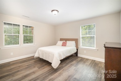 Step into Lake Wylie's finest living with a waterfront home that on The Palisades Country Club in North Carolina - for sale on GolfHomes.com, golf home, golf lot