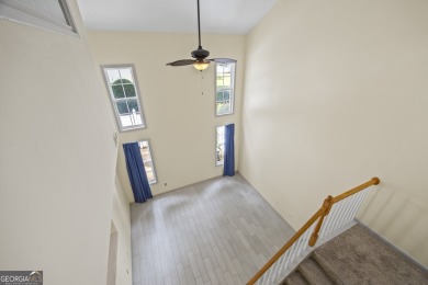 Charming  2-story townhome located in Little Suwanee Pointe on Collins Hill Golf Club in Georgia - for sale on GolfHomes.com, golf home, golf lot