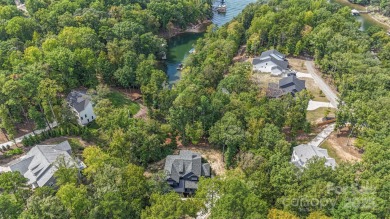 Step into Lake Wylie's finest living with a waterfront home that on The Palisades Country Club in North Carolina - for sale on GolfHomes.com, golf home, golf lot