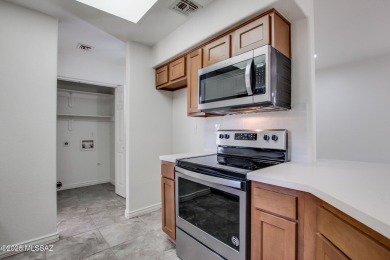 New Listing Alert!   Ground-level condo updated with a modern on The Lodge at Ventana Canyon - Canyon  in Arizona - for sale on GolfHomes.com, golf home, golf lot
