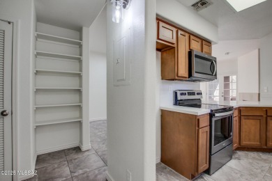 New Listing Alert!   Ground-level condo updated with a modern on The Lodge at Ventana Canyon - Canyon  in Arizona - for sale on GolfHomes.com, golf home, golf lot
