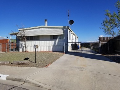 Victorville, Ca.  16782 Pebble Beach Court.  Manufactured home on Green Tree Golf Course in California - for sale on GolfHomes.com, golf home, golf lot