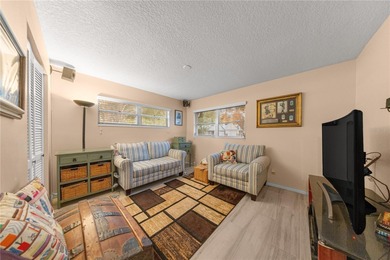 Beautifully maintained 2-bedroom, 2-bath Extended Montgomery on On Top of the World Golf Course in Florida - for sale on GolfHomes.com, golf home, golf lot