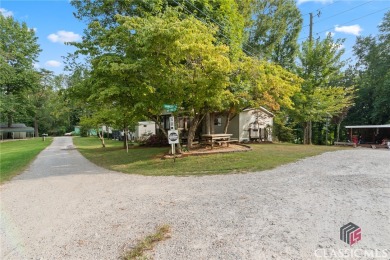 Affordable and Adorable Lake Lanier Living! on Chestatee Golf Club in Georgia - for sale on GolfHomes.com, golf home, golf lot