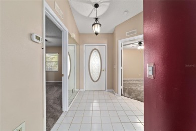 Franklin Model on Private Corner Lot with Golf Course Views in on On Top of the World Golf Course in Florida - for sale on GolfHomes.com, golf home, golf lot
