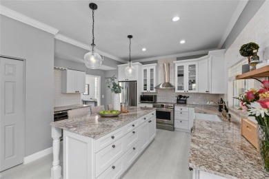 Welcome to your Updated 5 Bedroom, 3.5 Bathroom + Huge Bonus on The Eagles Golf Course and Club in Florida - for sale on GolfHomes.com, golf home, golf lot