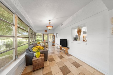 Beautifully maintained 2-bedroom, 2-bath Extended Montgomery on On Top of the World Golf Course in Florida - for sale on GolfHomes.com, golf home, golf lot