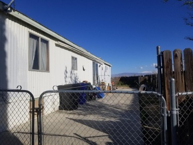 Victorville, Ca.  16782 Pebble Beach Court.  Manufactured home on Green Tree Golf Course in California - for sale on GolfHomes.com, golf home, golf lot