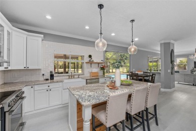 Welcome to your Updated 5 Bedroom, 3.5 Bathroom + Huge Bonus on The Eagles Golf Course and Club in Florida - for sale on GolfHomes.com, golf home, golf lot