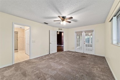 Franklin Model on Private Corner Lot with Golf Course Views in on On Top of the World Golf Course in Florida - for sale on GolfHomes.com, golf home, golf lot