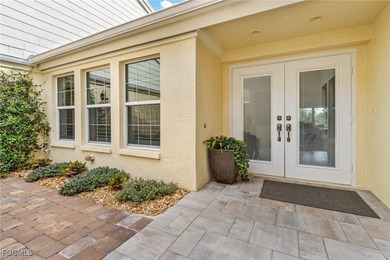 Move right into to this light and airy Carriedale cottage. A on Fiddlesticks Country Club in Florida - for sale on GolfHomes.com, golf home, golf lot