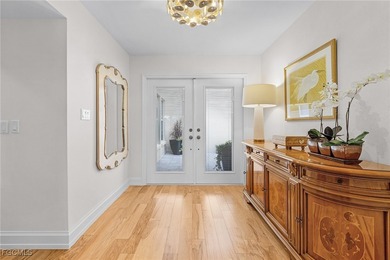 Move right into to this light and airy Carriedale cottage. A on Fiddlesticks Country Club in Florida - for sale on GolfHomes.com, golf home, golf lot