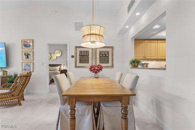 Move right into to this light and airy Carriedale cottage. A on Fiddlesticks Country Club in Florida - for sale on GolfHomes.com, golf home, golf lot