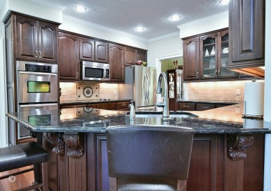 Welcome to this beautifully designed 4-bedroom, 4.5-bathroom on Maple Ridge Golf Club in Georgia - for sale on GolfHomes.com, golf home, golf lot