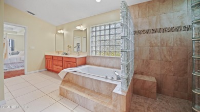 Located in the sought-after Cypress Knoll neighborhood of Palm on The Grand Club Cypress Course in Florida - for sale on GolfHomes.com, golf home, golf lot