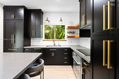 This elegant 4 Bed, 3 Bath Spanish Colonial-style residence on Riviera Country Club in Florida - for sale on GolfHomes.com, golf home, golf lot