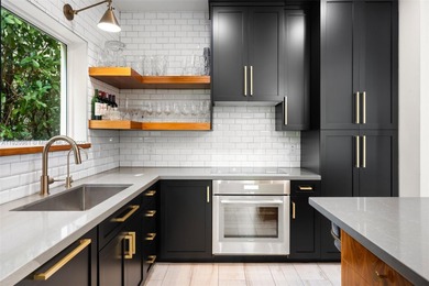 This elegant 4 Bed, 3 Bath Spanish Colonial-style residence on Riviera Country Club in Florida - for sale on GolfHomes.com, golf home, golf lot