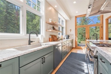 This stunning home is tucked into a quiet cul-de-sac in the on Rollingstone Ranch Golf Club in Colorado - for sale on GolfHomes.com, golf home, golf lot