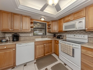 This charming and comfortable villa has it all! With its warm on Jacaranda West Country Club in Florida - for sale on GolfHomes.com, golf home, golf lot