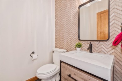 This stunning home is tucked into a quiet cul-de-sac in the on Rollingstone Ranch Golf Club in Colorado - for sale on GolfHomes.com, golf home, golf lot