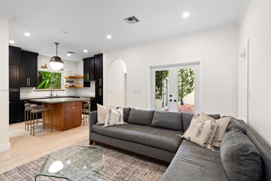 This elegant 4 Bed, 3 Bath Spanish Colonial-style residence on Riviera Country Club in Florida - for sale on GolfHomes.com, golf home, golf lot