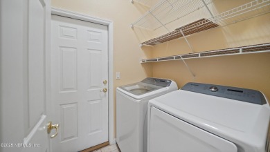Located in the sought-after Cypress Knoll neighborhood of Palm on The Grand Club Cypress Course in Florida - for sale on GolfHomes.com, golf home, golf lot