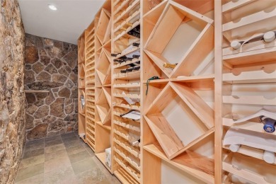 This stunning home is tucked into a quiet cul-de-sac in the on Rollingstone Ranch Golf Club in Colorado - for sale on GolfHomes.com, golf home, golf lot
