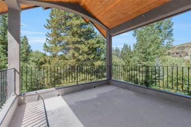 This stunning home is tucked into a quiet cul-de-sac in the on Rollingstone Ranch Golf Club in Colorado - for sale on GolfHomes.com, golf home, golf lot
