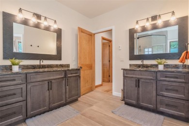 This stunning home is tucked into a quiet cul-de-sac in the on Rollingstone Ranch Golf Club in Colorado - for sale on GolfHomes.com, golf home, golf lot