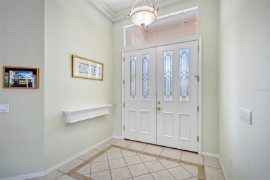 Welcome to this exquisite single-story home in University Park on University Park Country Club in Florida - for sale on GolfHomes.com, golf home, golf lot