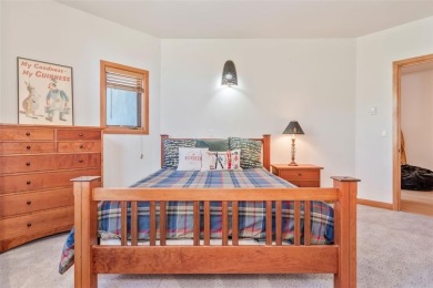 This stunning home is tucked into a quiet cul-de-sac in the on Rollingstone Ranch Golf Club in Colorado - for sale on GolfHomes.com, golf home, golf lot