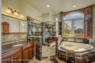 This breathtakingly elegant property offers an idyllic setting on The Powder Horn Golf Club - Mountain in Wyoming - for sale on GolfHomes.com, golf home, golf lot
