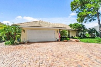 Nestled in the prestigious Marlwood Estates of PGA National on PGA National Golf Club in Florida - for sale on GolfHomes.com, golf home, golf lot