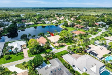 Nestled in the prestigious Marlwood Estates of PGA National on PGA National Golf Club in Florida - for sale on GolfHomes.com, golf home, golf lot