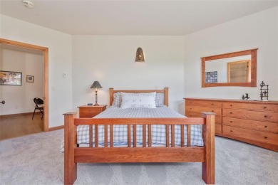 This stunning home is tucked into a quiet cul-de-sac in the on Rollingstone Ranch Golf Club in Colorado - for sale on GolfHomes.com, golf home, golf lot