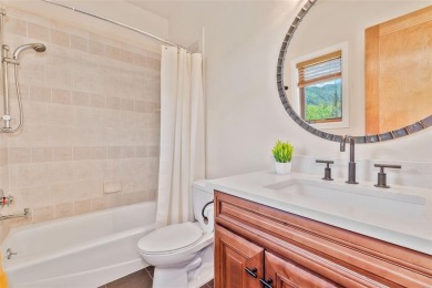 This stunning home is tucked into a quiet cul-de-sac in the on Rollingstone Ranch Golf Club in Colorado - for sale on GolfHomes.com, golf home, golf lot