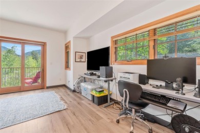 This stunning home is tucked into a quiet cul-de-sac in the on Rollingstone Ranch Golf Club in Colorado - for sale on GolfHomes.com, golf home, golf lot