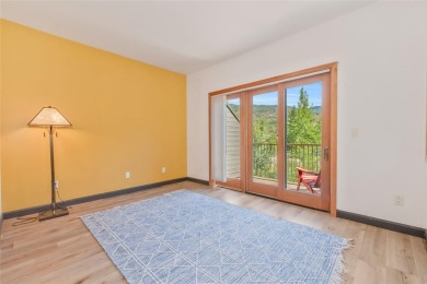 This stunning home is tucked into a quiet cul-de-sac in the on Rollingstone Ranch Golf Club in Colorado - for sale on GolfHomes.com, golf home, golf lot