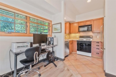 This stunning home is tucked into a quiet cul-de-sac in the on Rollingstone Ranch Golf Club in Colorado - for sale on GolfHomes.com, golf home, golf lot