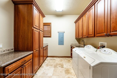 This breathtakingly elegant property offers an idyllic setting on The Powder Horn Golf Club - Mountain in Wyoming - for sale on GolfHomes.com, golf home, golf lot