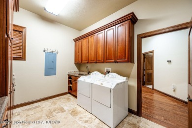This breathtakingly elegant property offers an idyllic setting on The Powder Horn Golf Club - Mountain in Wyoming - for sale on GolfHomes.com, golf home, golf lot