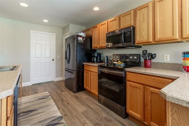 Meticulously maintained MELBOURNE model. 3 BEDROOM, 2-BATH home on Summerglen Country Club in Florida - for sale on GolfHomes.com, golf home, golf lot