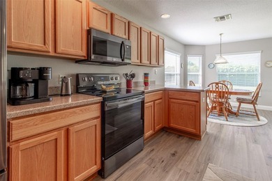 Meticulously maintained MELBOURNE model. 3 BEDROOM, 2-BATH home on Summerglen Country Club in Florida - for sale on GolfHomes.com, golf home, golf lot