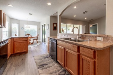 Meticulously maintained MELBOURNE model. 3 BEDROOM, 2-BATH home on Summerglen Country Club in Florida - for sale on GolfHomes.com, golf home, golf lot