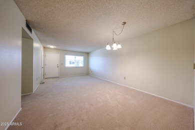 Welcome to this move-in-ready 2-bedroom, 2-bath end unit condo on Sun City Lakes West and East in Arizona - for sale on GolfHomes.com, golf home, golf lot