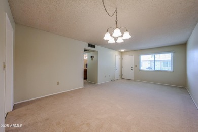 Welcome to this move-in-ready 2-bedroom, 2-bath end unit condo on Sun City Lakes West and East in Arizona - for sale on GolfHomes.com, golf home, golf lot