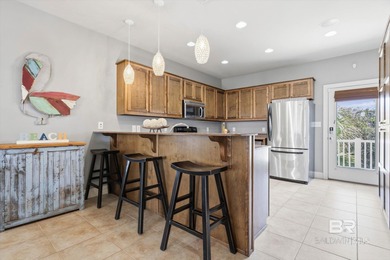 Experience coastal luxury in this beautifully designed 5-bedroom on Kiva Dunes Golf Club in Alabama - for sale on GolfHomes.com, golf home, golf lot