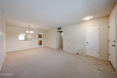 Welcome to this move-in-ready 2-bedroom, 2-bath end unit condo on Sun City Lakes West and East in Arizona - for sale on GolfHomes.com, golf home, golf lot