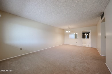 Welcome to this move-in-ready 2-bedroom, 2-bath end unit condo on Sun City Lakes West and East in Arizona - for sale on GolfHomes.com, golf home, golf lot